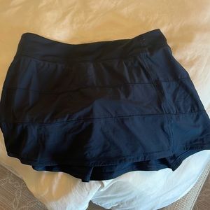 Lululemon navy skirt with shorts lining. Size 8